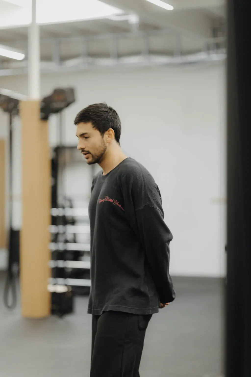 Coach Santi on the gym floor at Focus Athletics in Costa Mesa, the online personal trainer who writes each Orange County client's plan from scratch